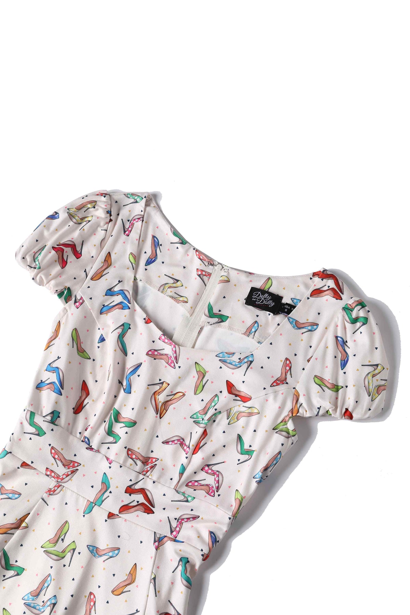 Close up View of Stiletto Print Cap Sleeved Swing Dress in Cream