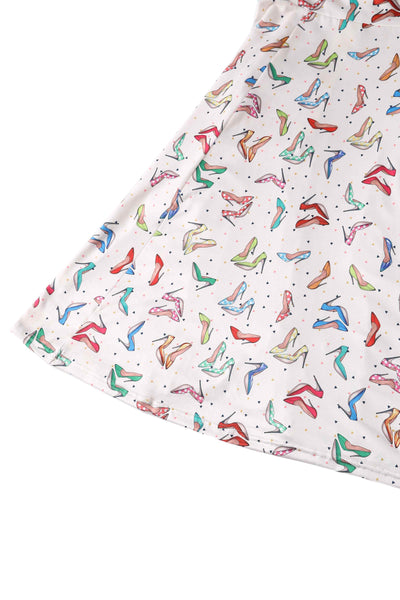 Close up View of Stiletto Print Cap Sleeved Swing Dress in Cream
