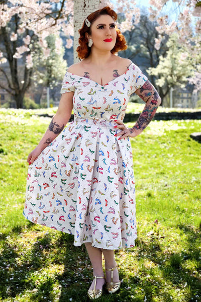 A model wearing a Stiletto Print Off Shoulder Dress