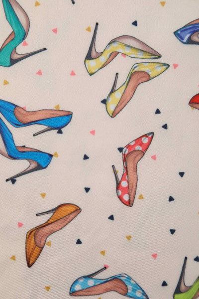 Close up view of Stiletto Print Off Shoulder Dress in Cream