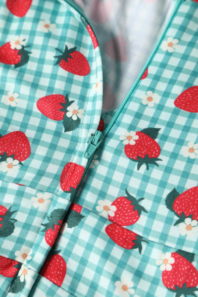Close up view of Strawberry Midi Dress In Blue Gingham
