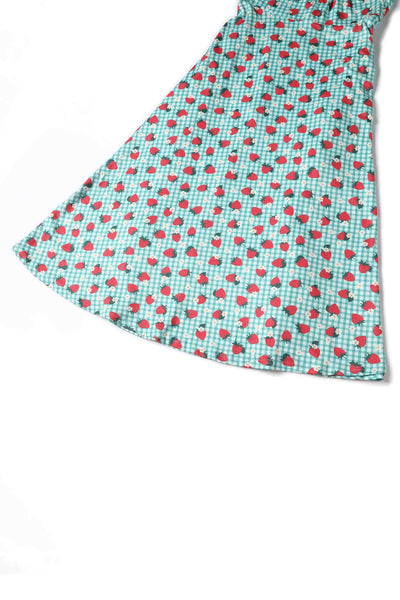 Close up view of Strawberry Midi Dress In Blue Gingham