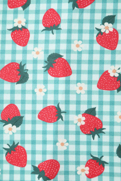 Close up view of Strawberry Midi Dress In Blue Gingham