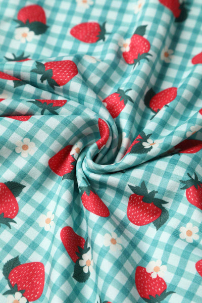 Close up view of Strawberry Midi Dress In Blue Gingham