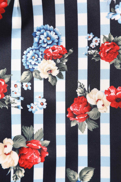 Close up View of Striped and Floral Print Fitted Dress in White and Black
