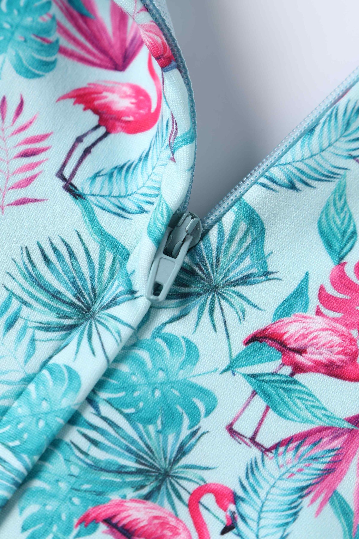 Close up view of View of Summer Flamingo Baby Blue Jumpsuit