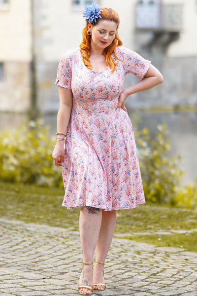 A model wearing a Summer Pink Meadow Dress