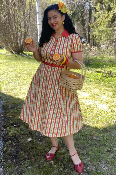 A model wearing Summer Orange Midi Shirt Dress