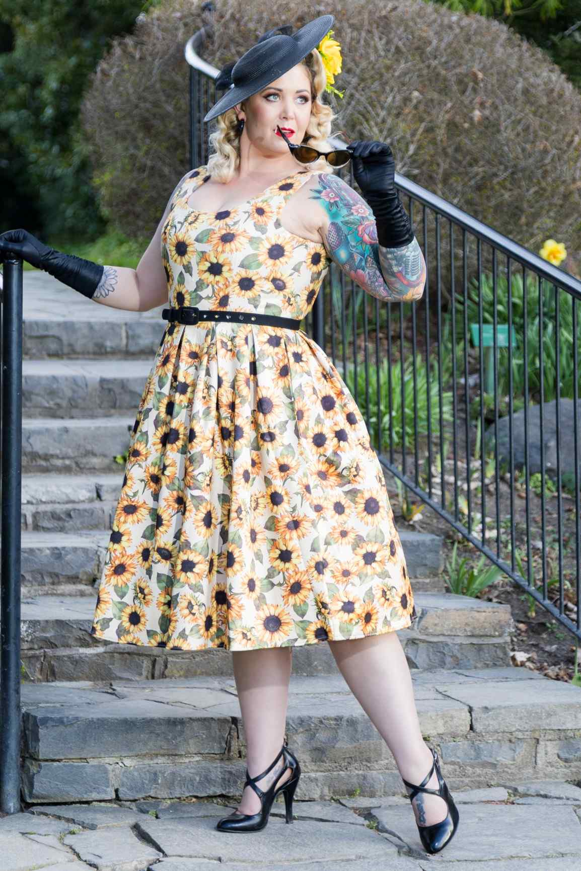 A woman wearing an Amanda Sunflower Flared Dress