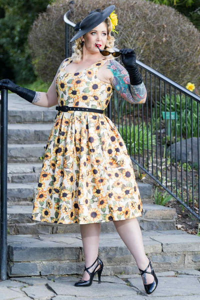 A woman wearing an Amanda Sunflower Flared Dress