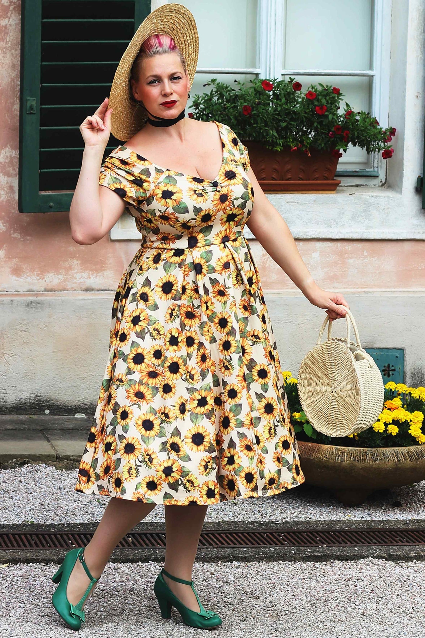 A model wearing a Lily Sunflower Off Shoulder Dress