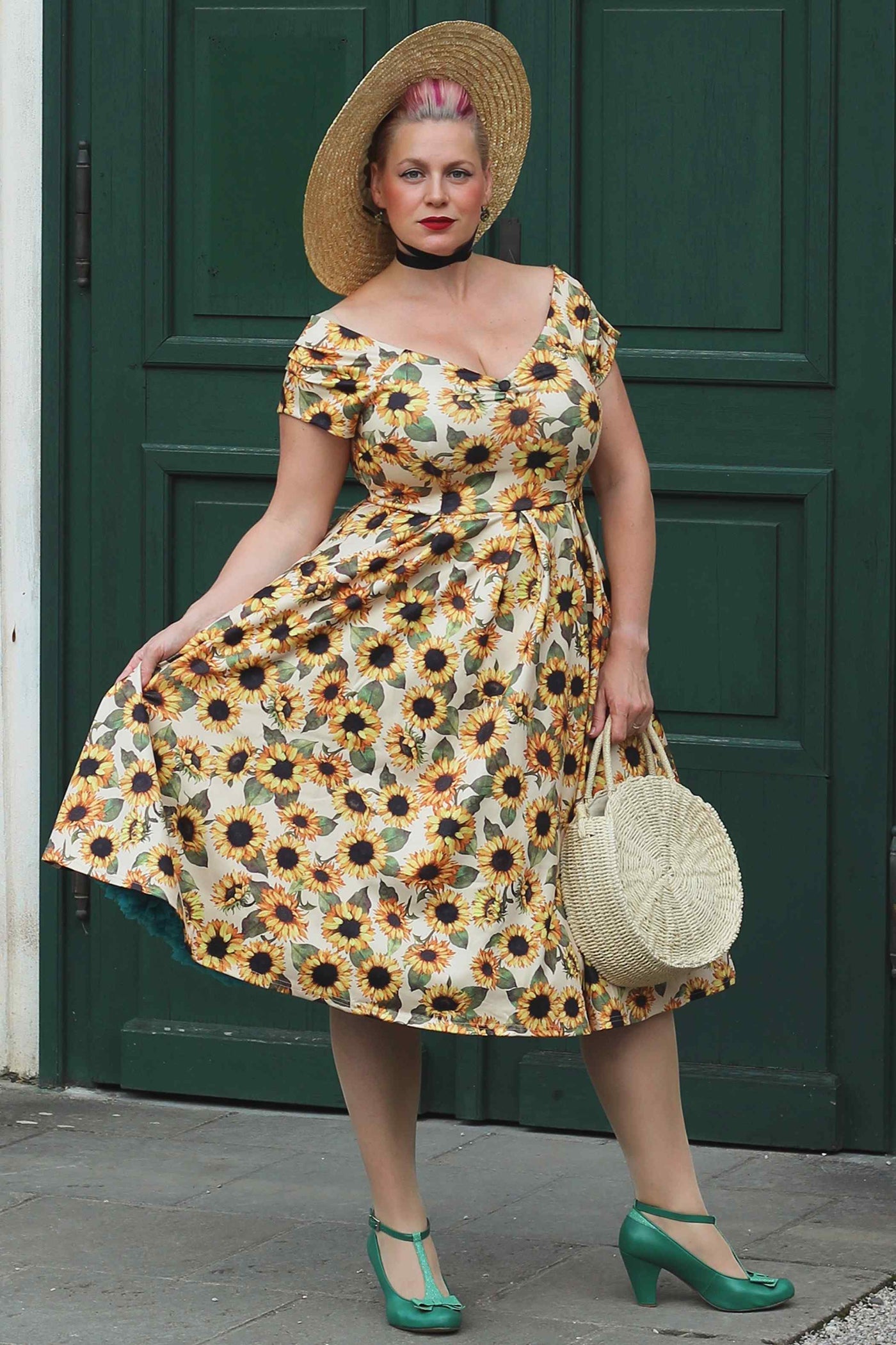 A lady wearing a Lily Sunflower Off Shoulder Dress