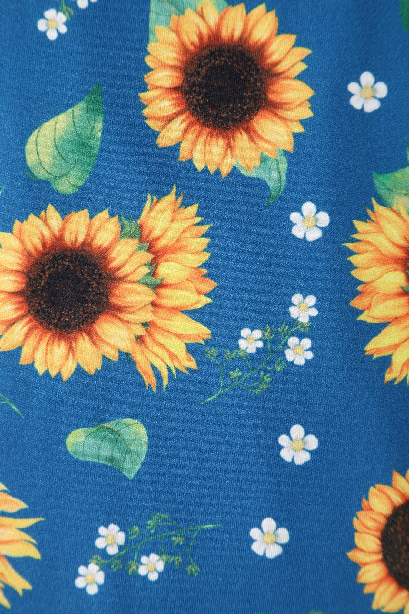 Close up View of Sunflower Print Jumpsuit in Blue