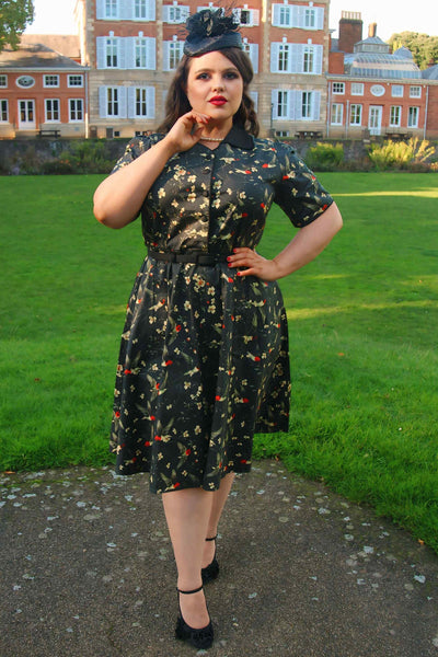 A Model photo of Swallow Floral Shirt Dress