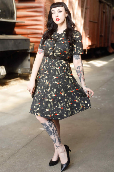 Front view of model wearing Swallow Floral Shirt Dress