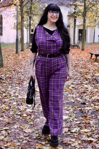 A model wearing a Sylvia Purple Tartan Jumpsuit