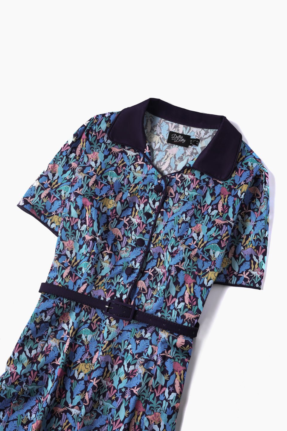 Close up view of Dinosaur Shirt Dress in Navy Blue