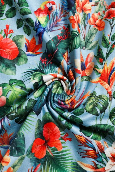 Close up view of Tropical Parrot Hibiscus Day Dress in Baby Blue