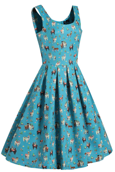 Side view of our sleeveless Amanda swing dress, in turquoise llama cactus print