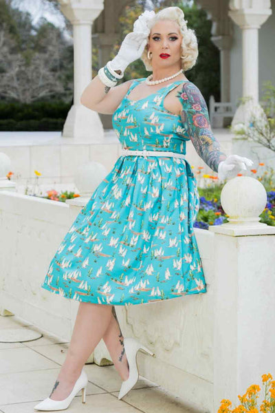 Model photo wearing Turquoise Meerkat Swing Dress