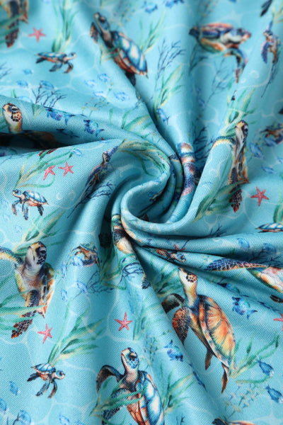 Close up view of Underwater Turtle Print Flared Dress in Light Blue