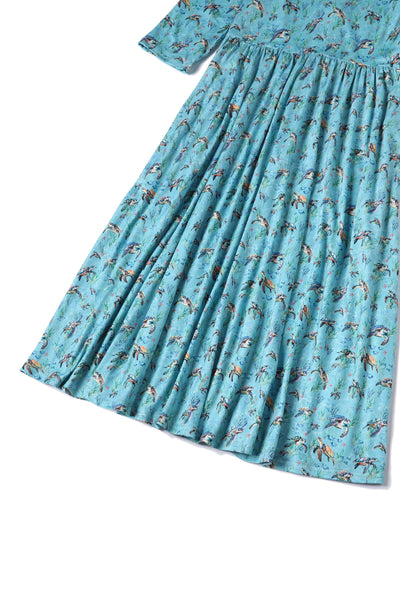 Close up view of Underwater Turtle Print Flared Dress in Light Blue