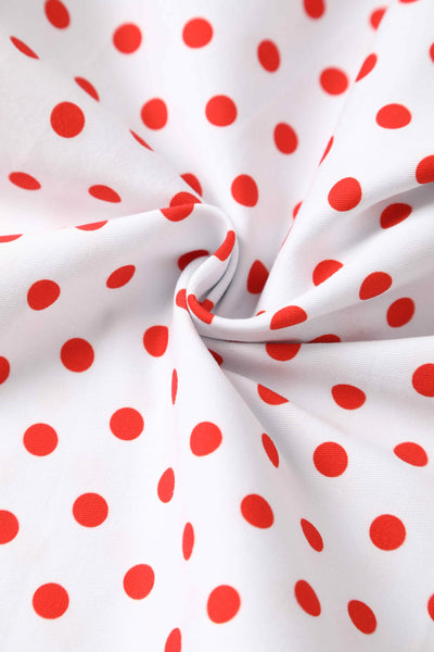 Close up view of V Neck White and Red Polka Dot Dress