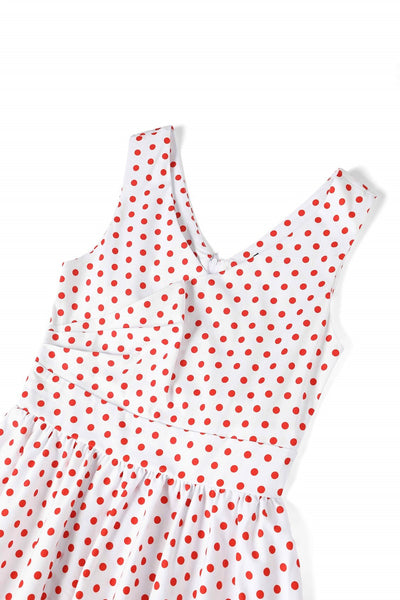 Close up view of V Neck White and Red Polka Dot Dress