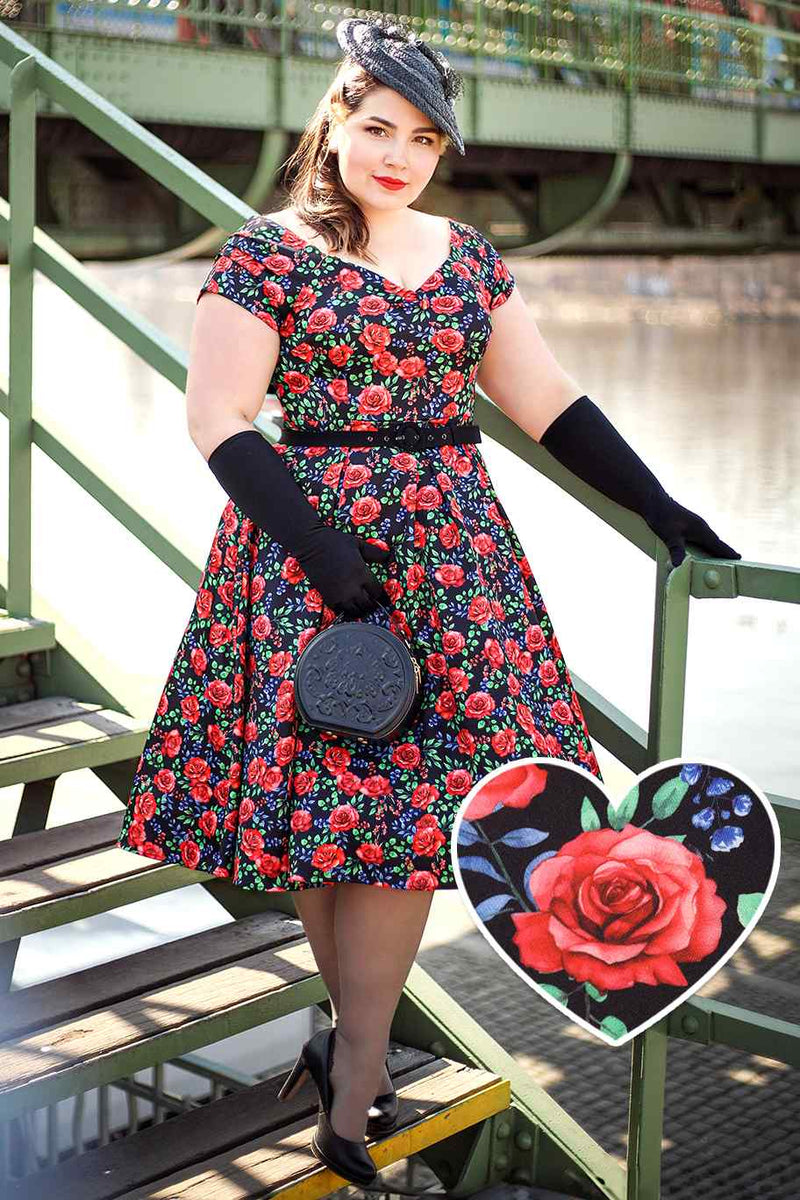 A lady wearing a Vintage Red Rose Off Shoulder Dress In Black