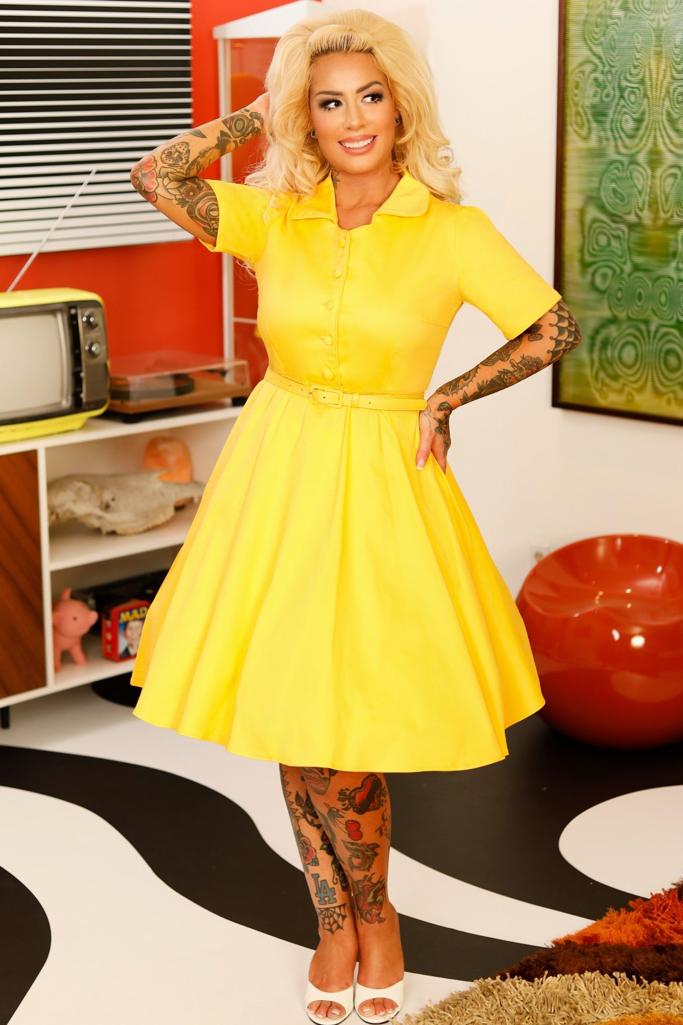 A lady wearing a Vintage Yellow Shirt Dress