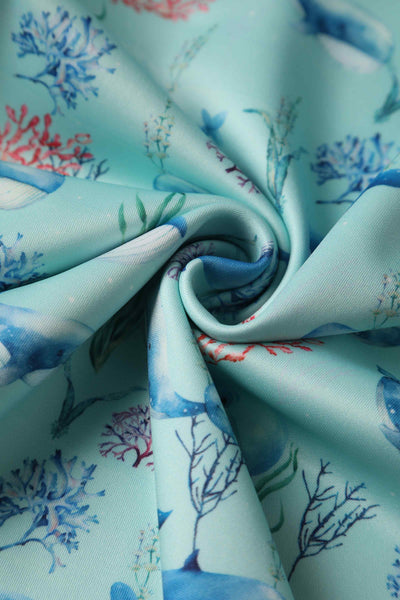 Close up View of Whale Print Swing Dress in Baby Blue