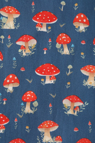 Close up view of Red Mushroom Shirt Dress in Blue