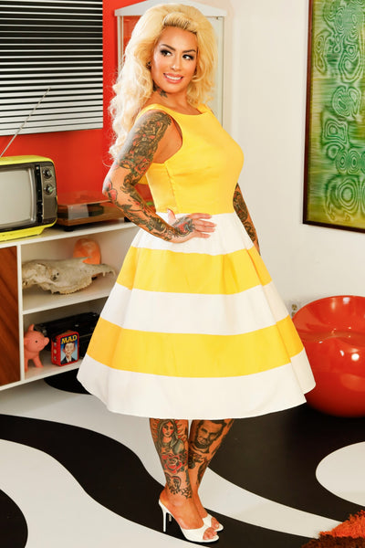 A model wearing a White & Yellow Striped 50s Swing Dress
