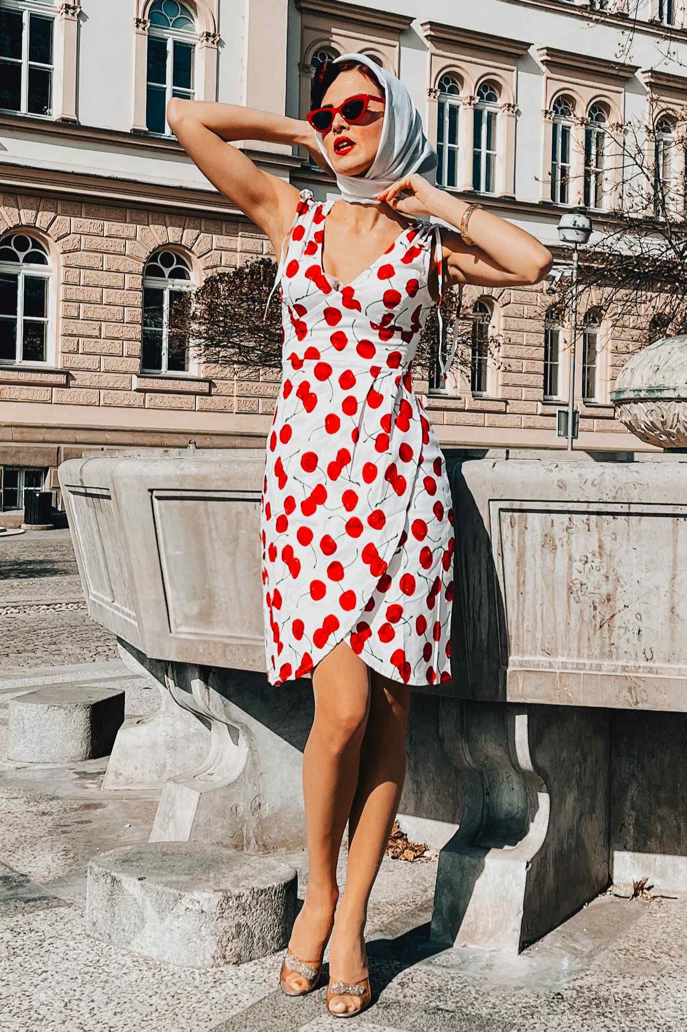 A model wearing White Cherry Wiggle Dress