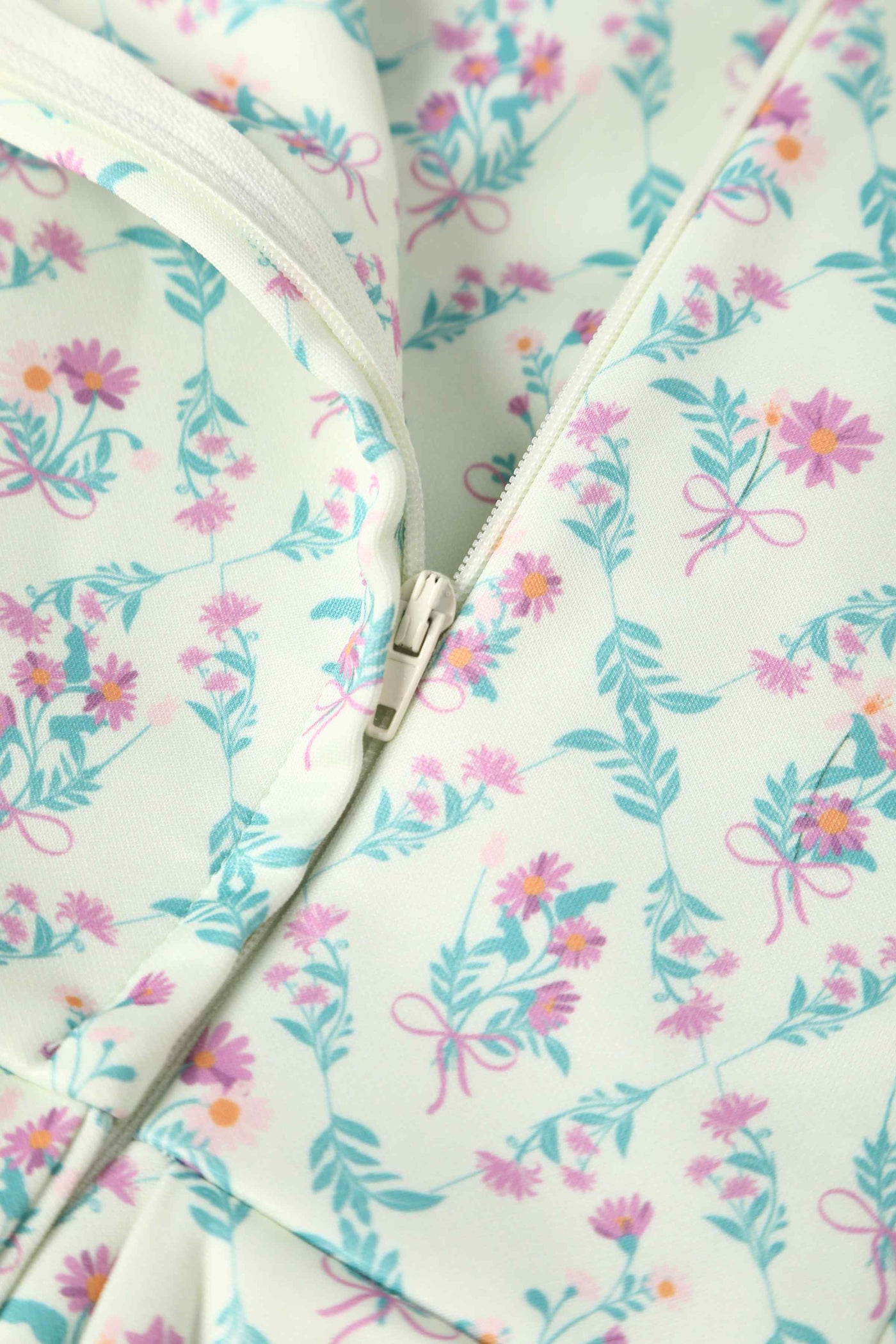 Close up view of White Floral Tile Off Shoulder Dress