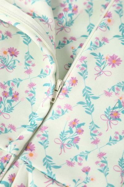 Close up view of White Floral Tile Off Shoulder Dress