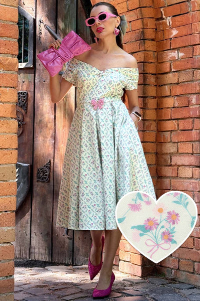 A women wearing a White Floral Tile Off Shoulder Dress