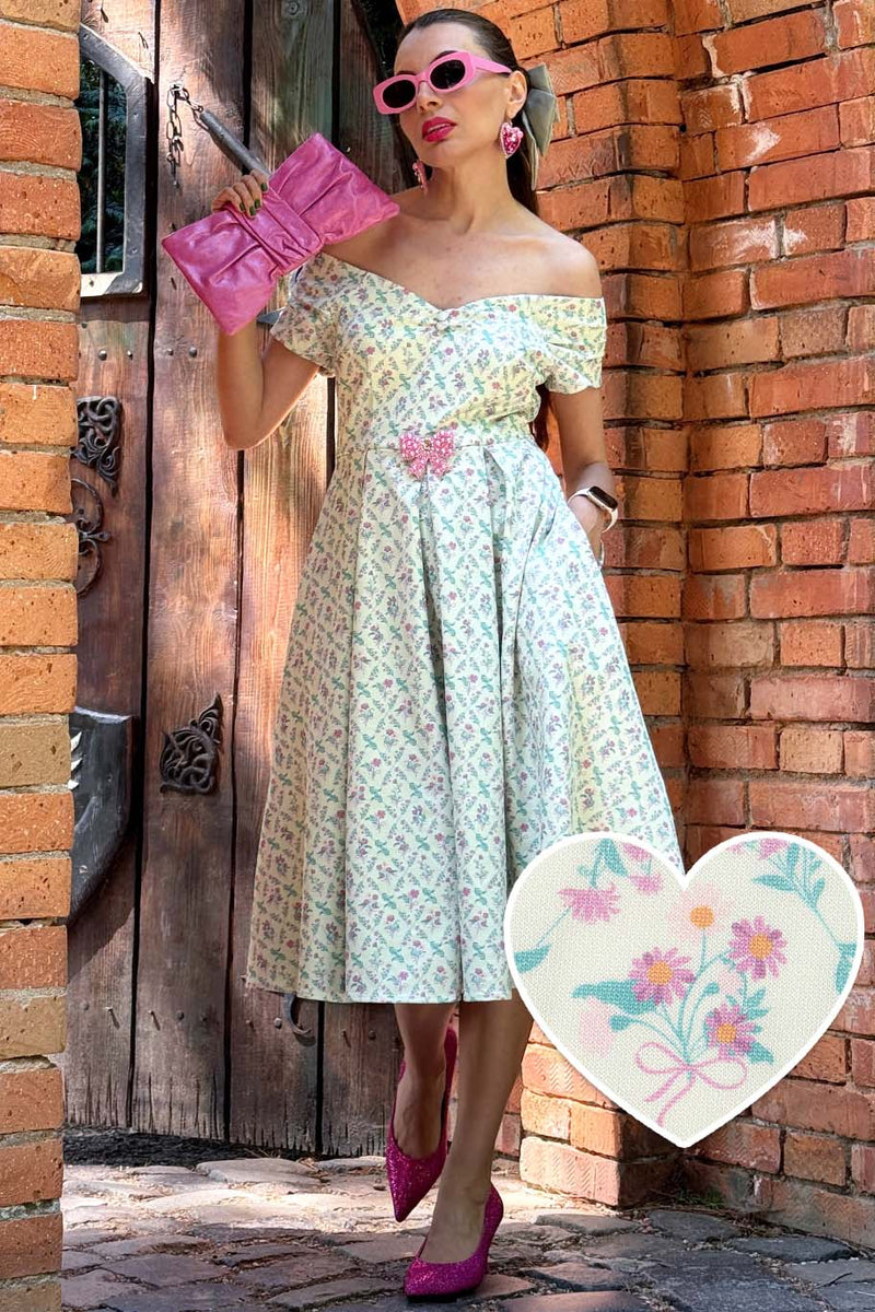 A women wearing a White Floral Tile Off Shoulder Dress