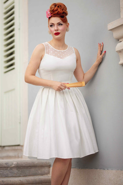 A model wearing a White Mesh Panel Bridal Swing Dress