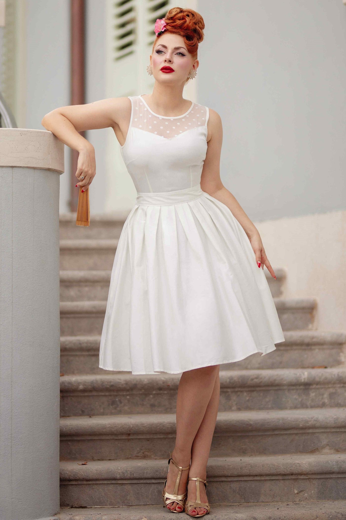 A model wearing a White Mesh Panel Bridal Swing Dress