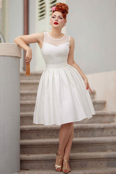 A model wearing a White Mesh Panel Bridal Swing Dress