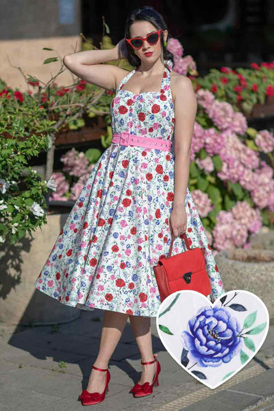 A girl wearing a Daisy White Rose Halter Dress