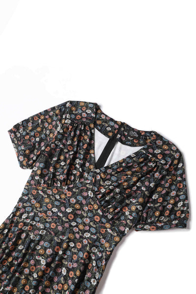 Close up view of the top of a Fabric of Julia Wildflower Midi Dress