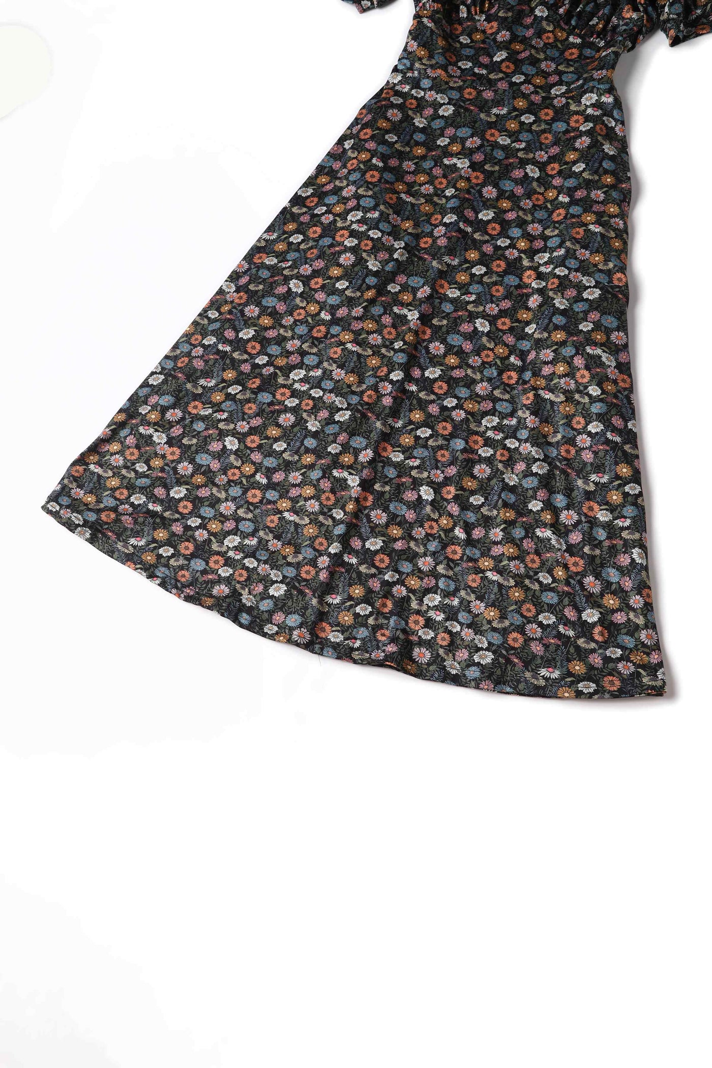 Close up view of the bottom of a Fabric of Julia Wildflower Midi Dress
