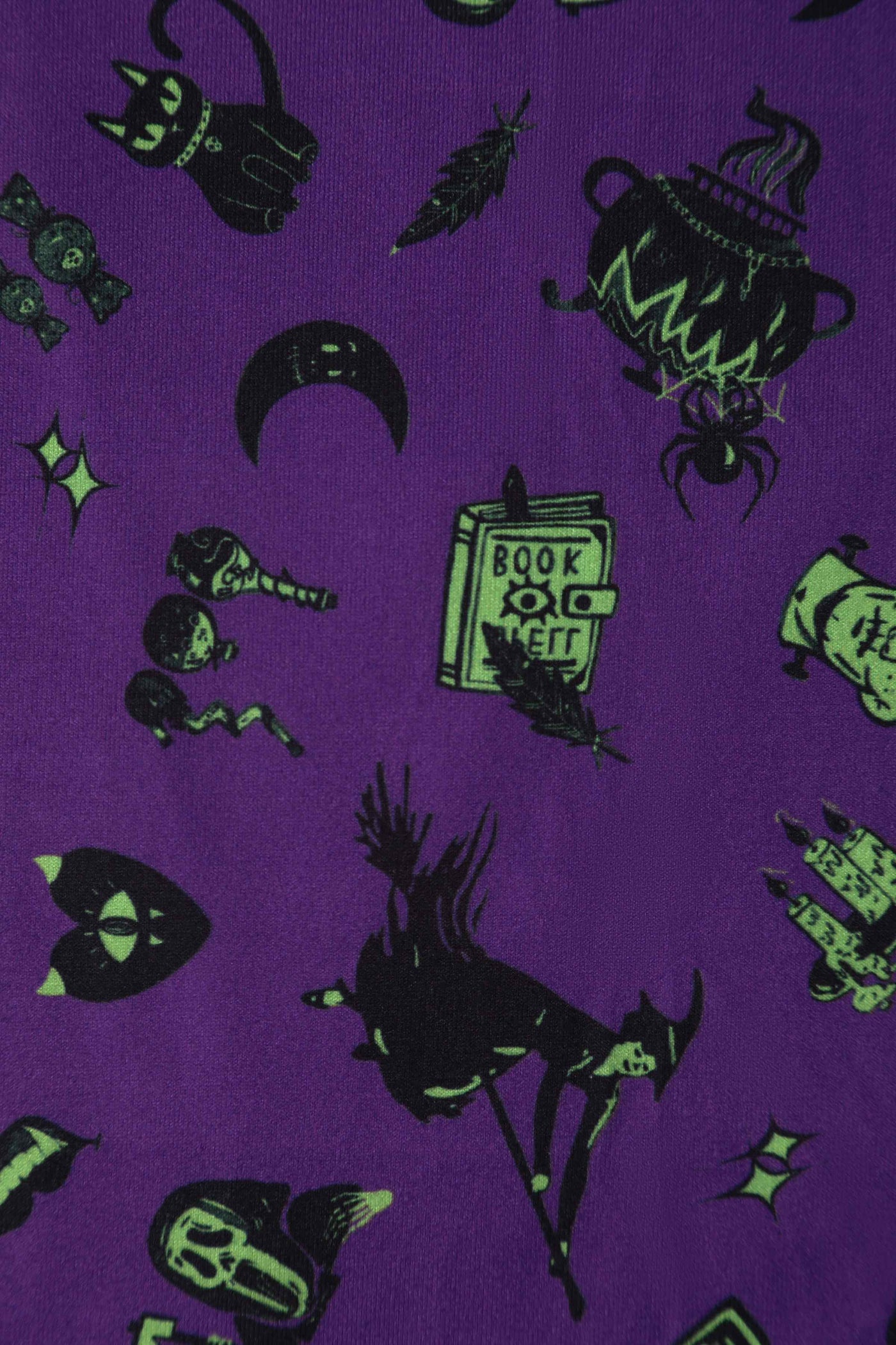 Close up View of Wizard and Witch Long Sleeved Swing Dress in Purple