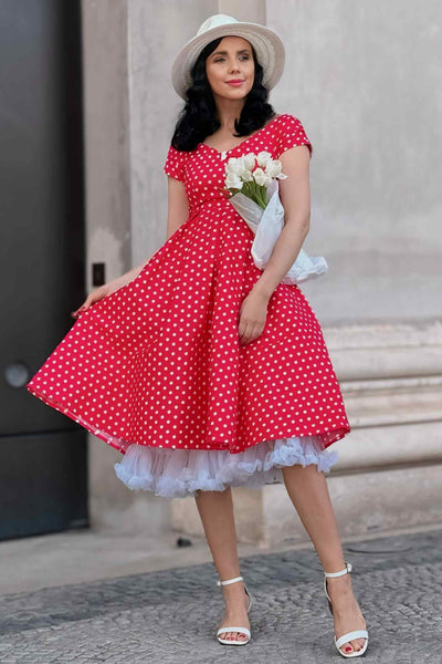 A model wearing a Off-Shoulder 50's Polka Dot Swing Dress in Red/White