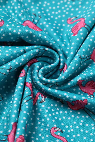 Close up View of Women's Turquoise Jumpsuit In Flamingo and Pebble Print