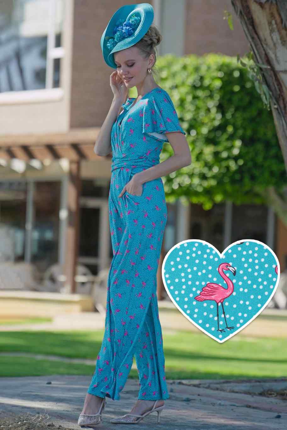 A lady wearing a Pink Flamingo & Pebble Turquoise Jumpsuit