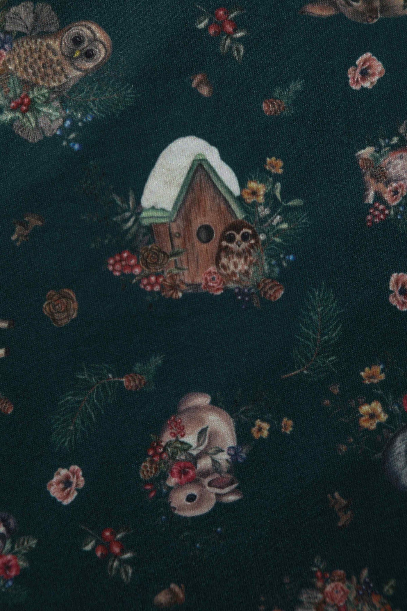 Close up view of Woodland Deer and Owl Dress in Green