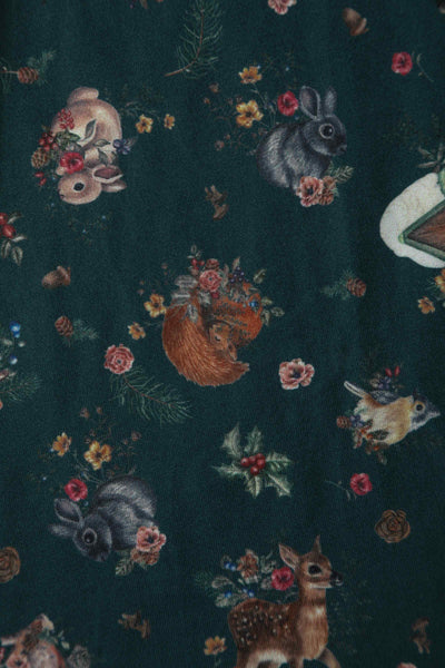 Close up view of view of Woodland Deer and Owl Dress in Green